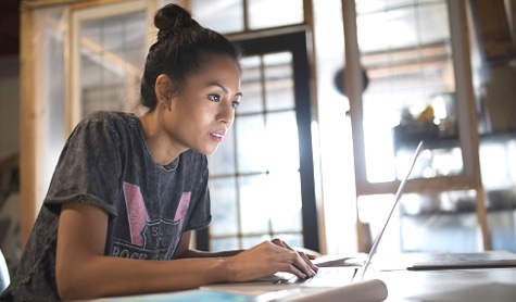 Female student working on laptop